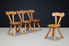 Set of Four French Sculptural Solid Walnut Dining Chairs, 1950s