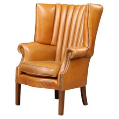 Exceptional Sculptural Barrel-Back Wing Chair in Patinated Cognac Leather 1870