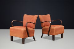 Par de sillones Art Déco de madera curvada patinada de Jindřich Halabala, década de 1930