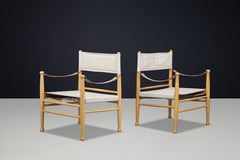 Paire de fauteuils « Safari » danois signés Farstrup, en toile et cuir, vers 1960