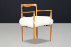 European Modern Beech and Sheepskin Dining Armchairs, 1970s 16 available.