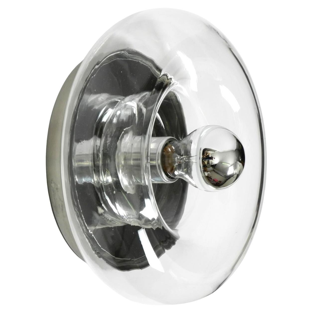 Original 70s round donut wall or ceiling lamp made of transparent glass by Doria For Sale