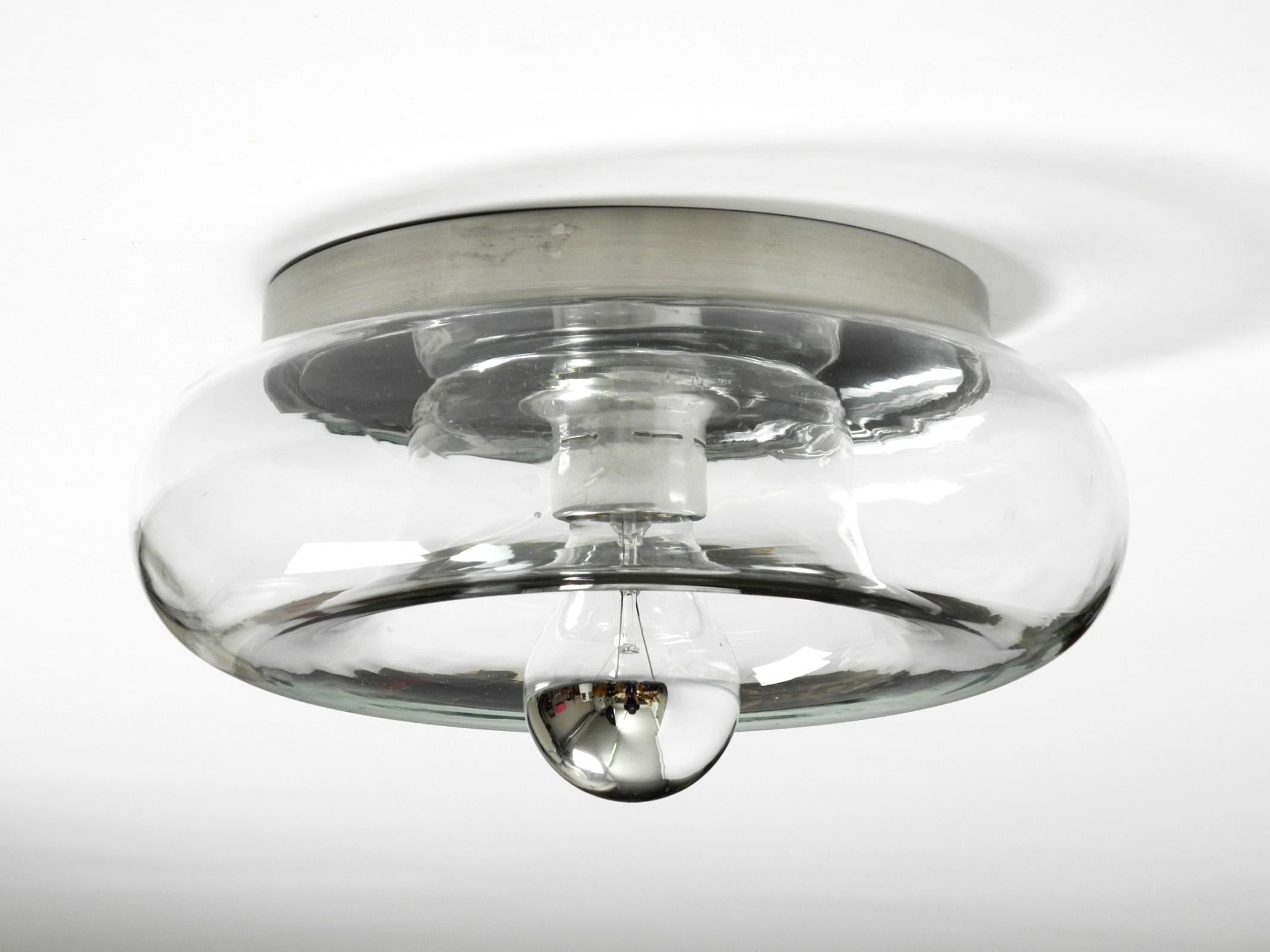 Late 20th Century Original 70s round donut wall or ceiling lamp made of transparent glass by Doria For Sale