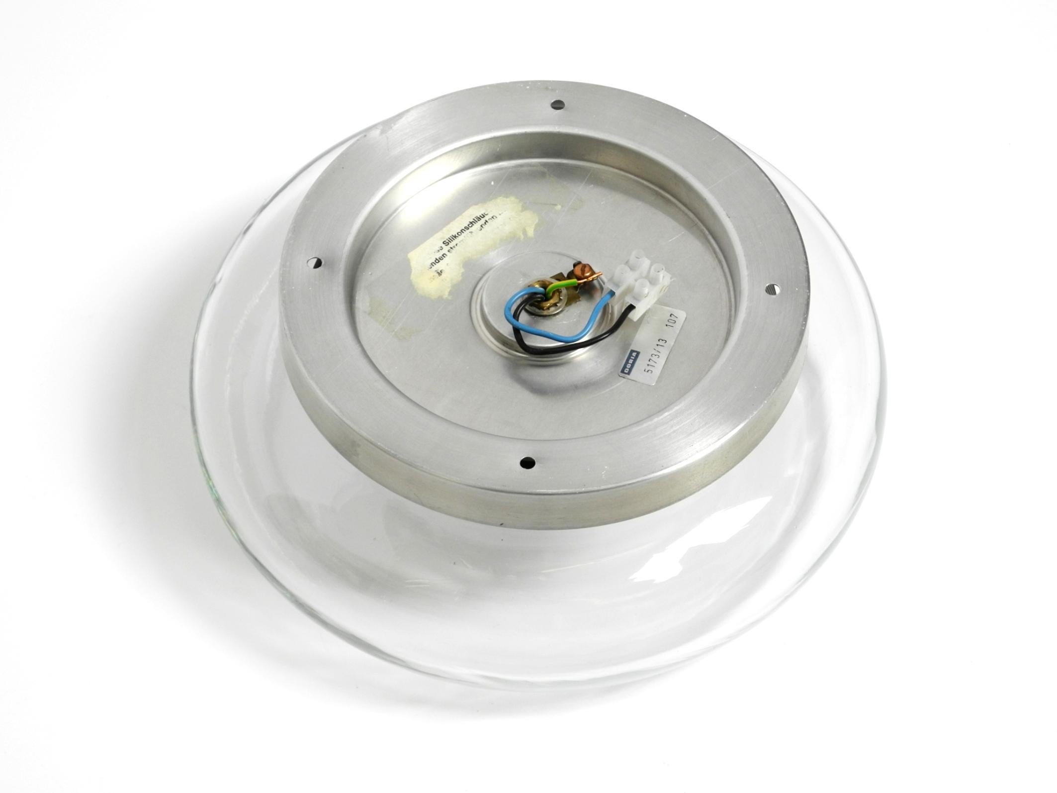 Original 70s round donut wall or ceiling lamp made of transparent glass by Doria For Sale 2