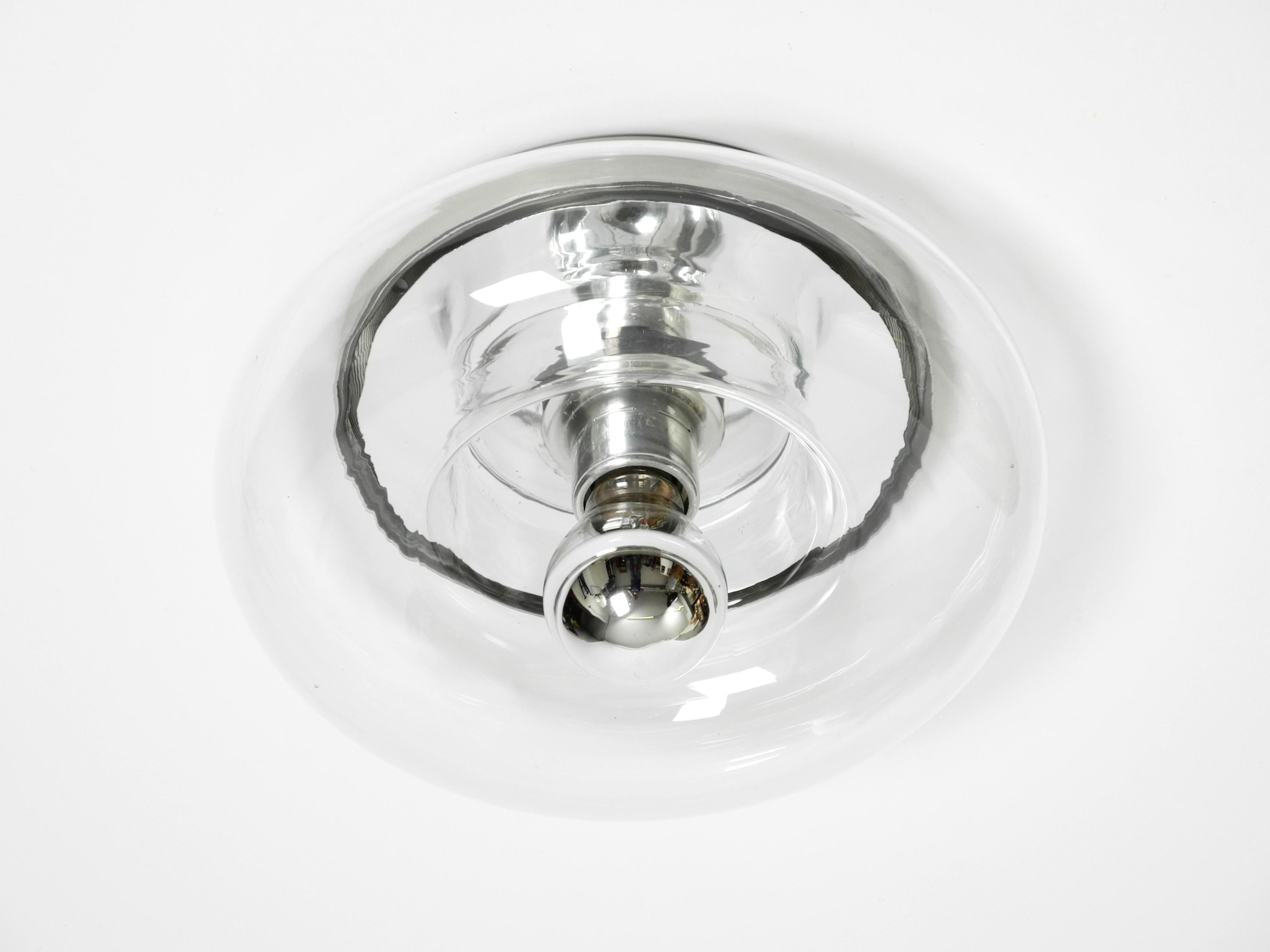 Original 70s round donut wall or ceiling lamp made of transparent glass by Doria For Sale 7
