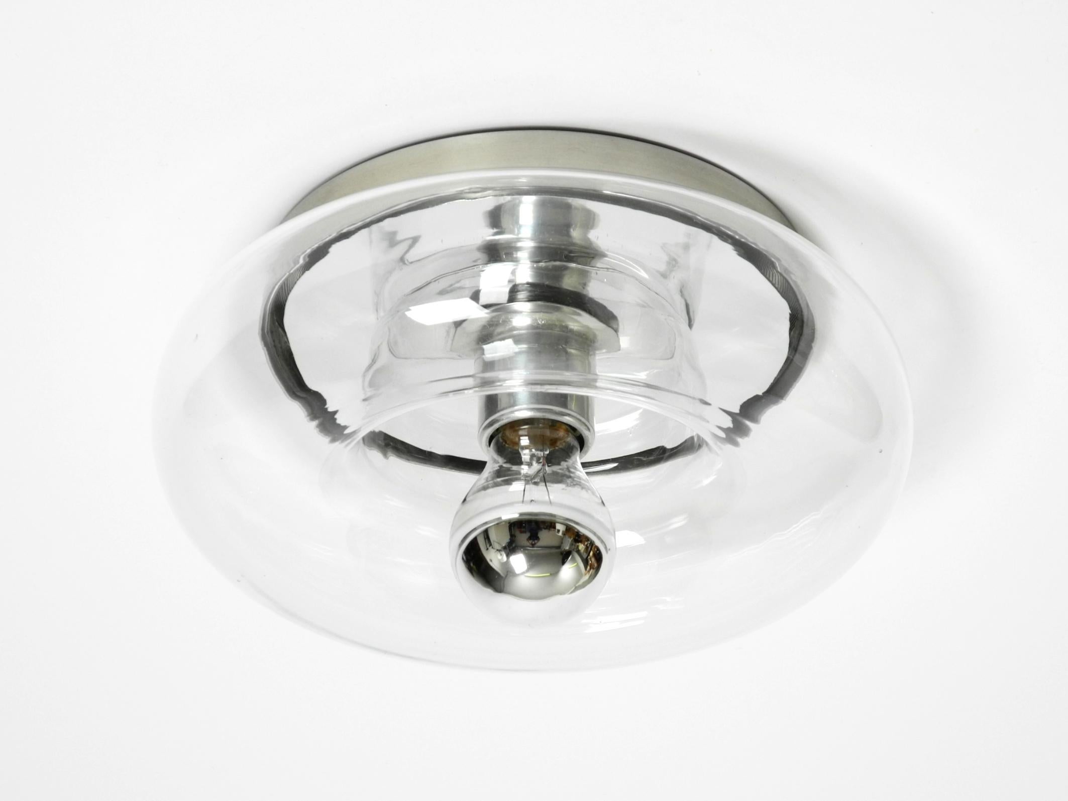 Original 70s round donut wall or ceiling lamp made of transparent glass by Doria For Sale 8