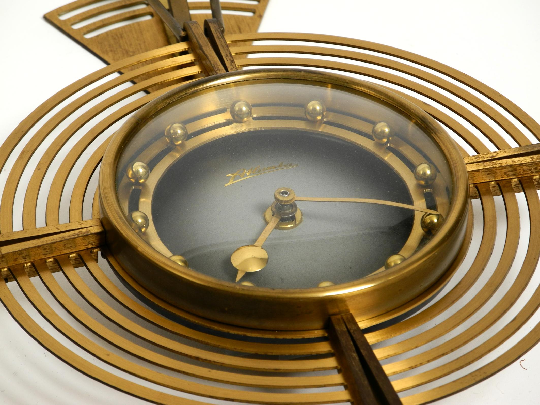 Brass Beautiful Mid Century Atlanta wall clock battery operated and made of brass For Sale