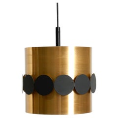 Lampada a sospensione in stile Mid-Century degli anni ’60 firmata Doria, realizzata in alluminio anodizzato color rame