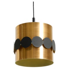 Lampada a sospensione in stile Mid-Century degli anni ’60 firmata Doria, realizzata in alluminio anodizzato color rame