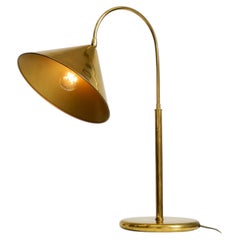 Large, original Mid-Century Modern brass table lamp with a conical shade