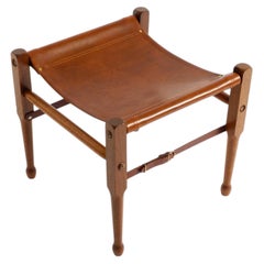 1990s safari stool with a teak frame and a seat made of brown saddle leather