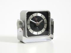 Space Age table clock by AEG, model "megaquarz", made of metal and aluminum