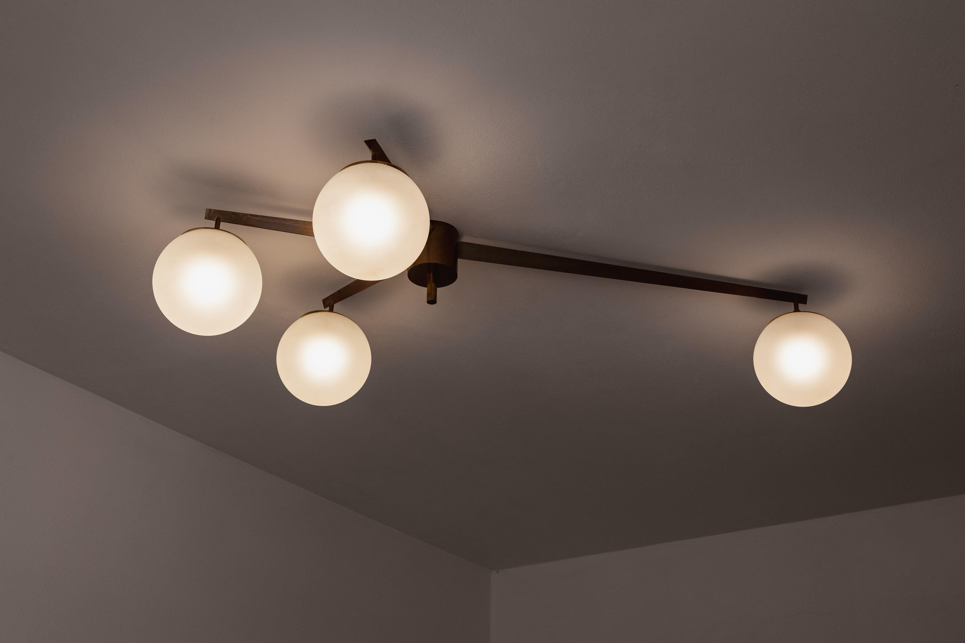 Angelo Lelii “Stella a 4” ceiling lamp for Arredoluce, brass and glass, Italy, 1959

Designed in 1959 by Angelo Lelii, the “Stella a 4” ceiling lamp reflects the refined balance between geometry and atmosphere that defined Italian lighting at