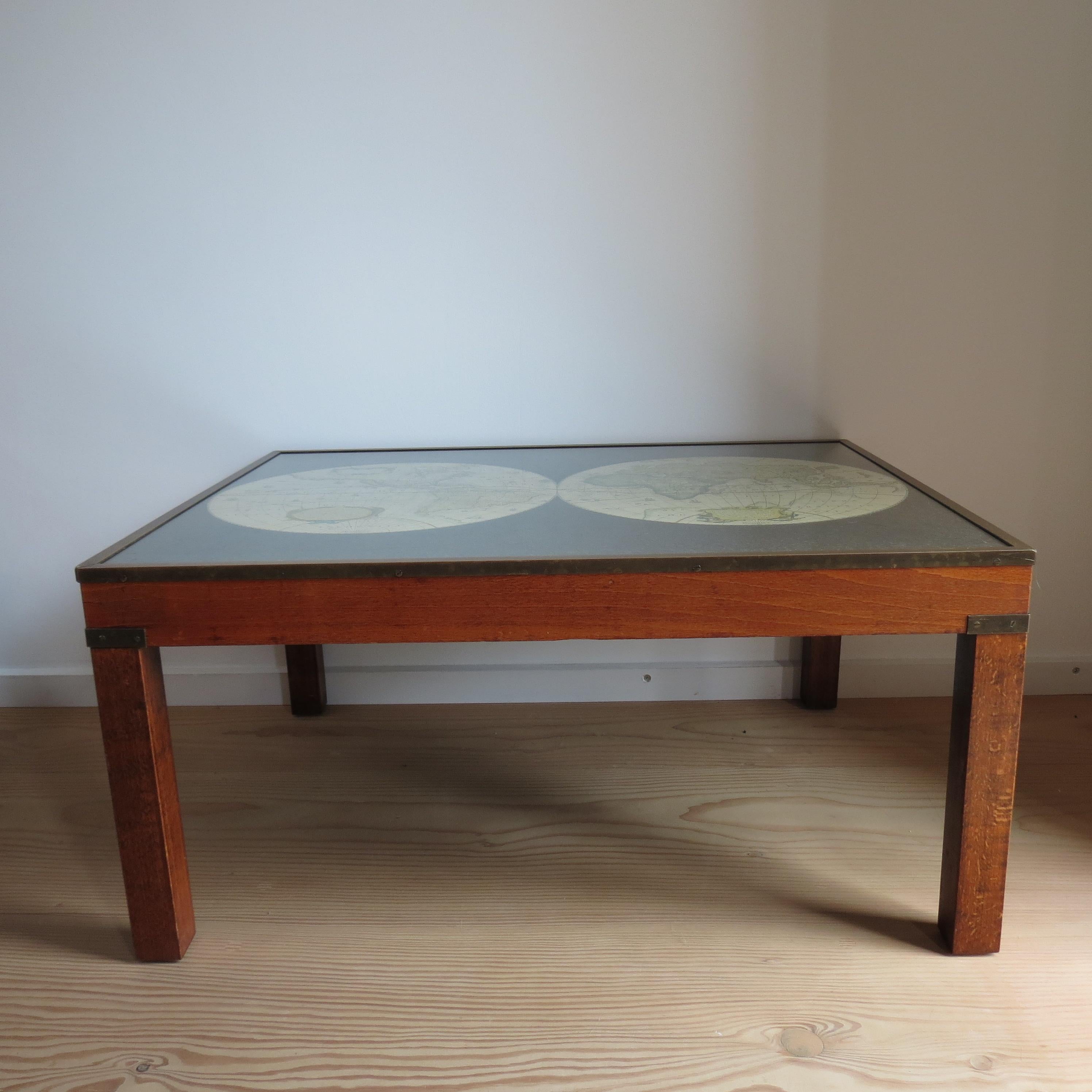 Wonderful campaign style coffee table by Maison Jansen, France. Dates from the 1970s. Beech legs with lovely detailed map insert to the table top, covered with a acrylic top.  Bronze and brass details to the legs and top edges. 

In good vintage