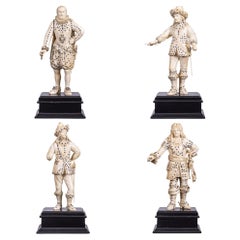A Set of Four Gem-Inlaid Carved Court Figures