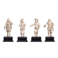 A Set of Four Gem-Inlaid Carved Court Figures