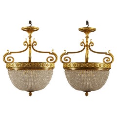 Bagues, Coppia di lampadari a cesto in bronzo dorato, Francia, 1880 circa