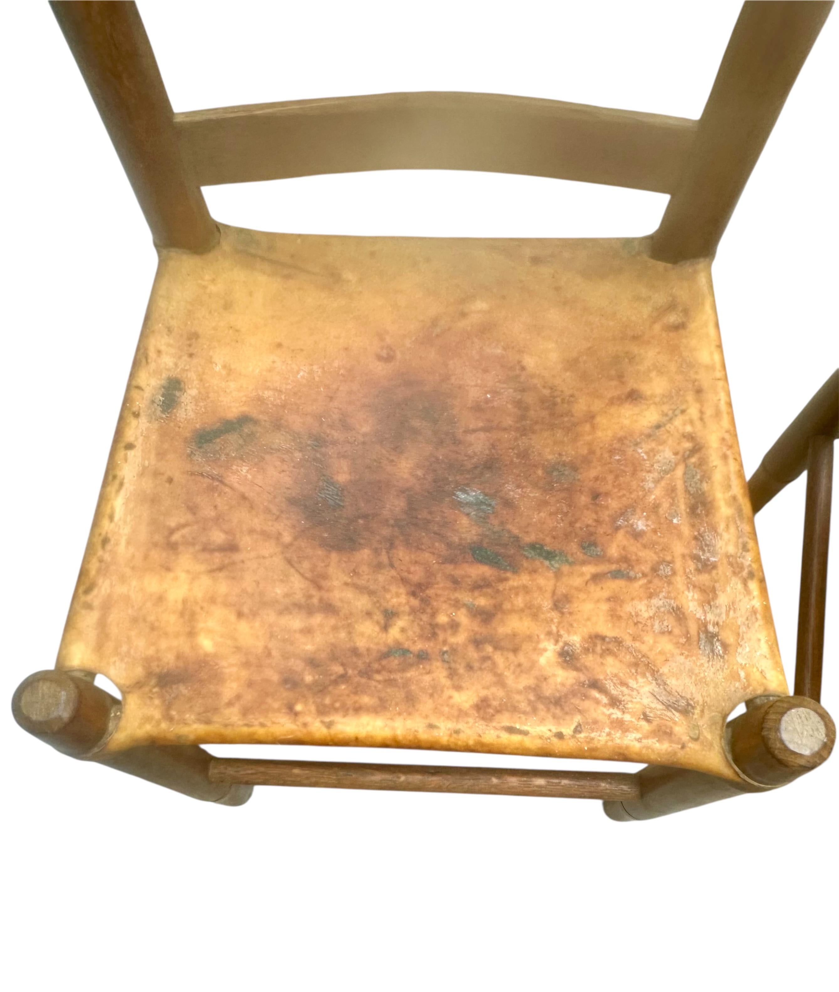 Set of Four Early 20th Century American Ladder-Back Wood and Deer Hide Chairs. In Good Condition For Sale In Vero Beach, FL