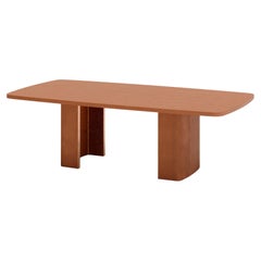 Rust-colored textured decor table and handmade copper-clad bases