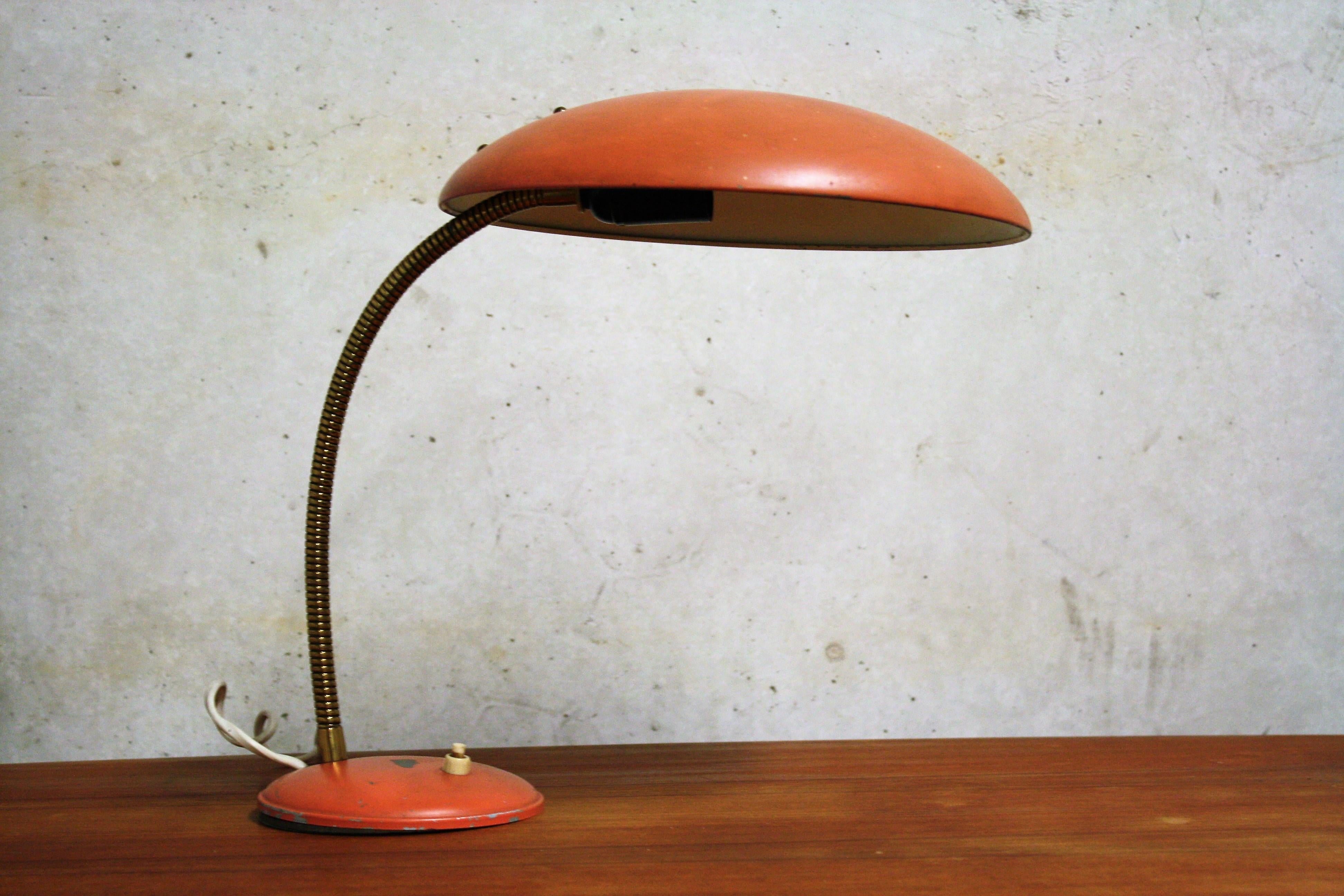 Orange midcentury Bauhaus table lamp 

Manufactured by the Dutch company Philips.

The Netherlands, 1960s. 

Tested and ready for use.

Dimensions: 
Height 42 cm/ 16.5