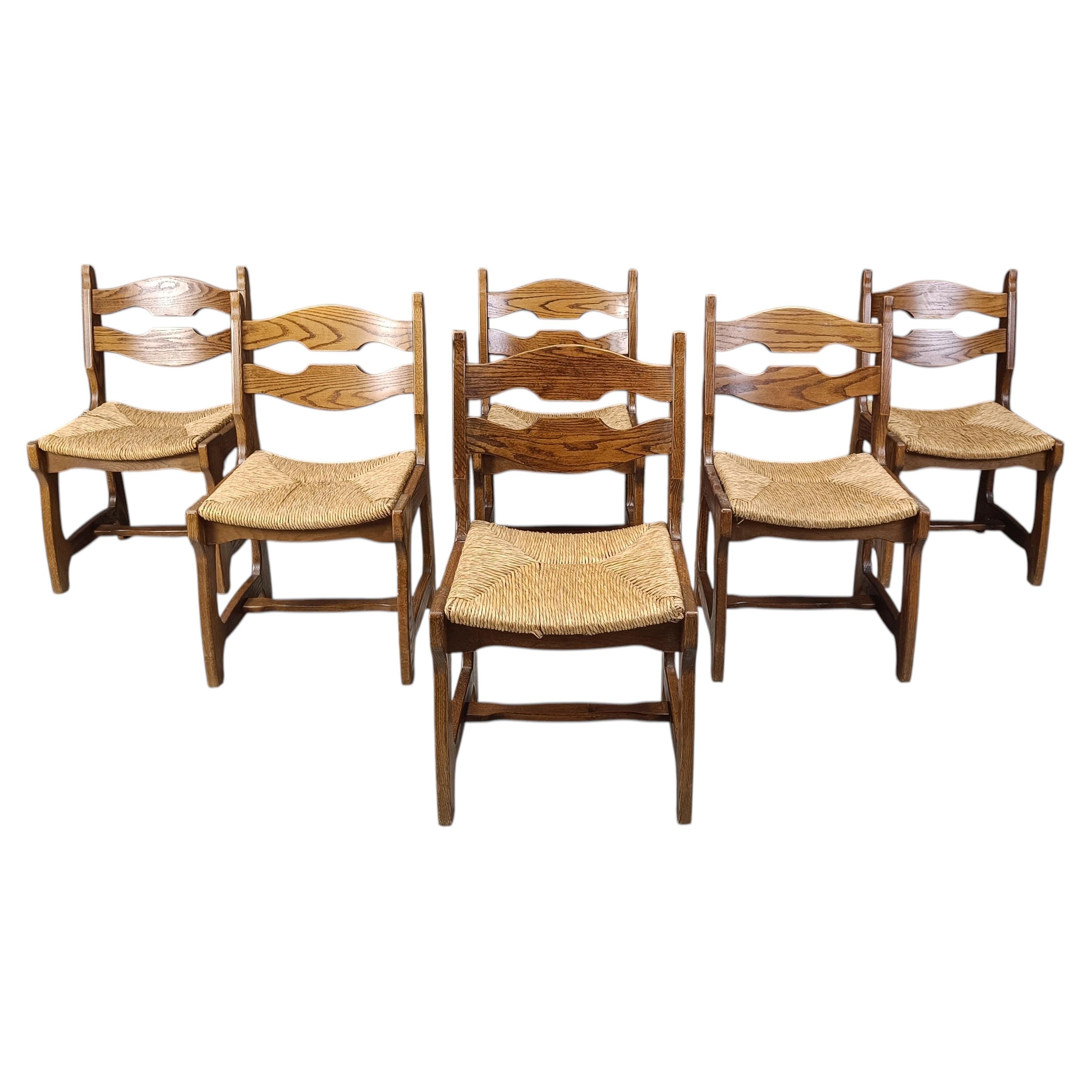 Vintage oak and wicker dining chairs, 1960s For Sale