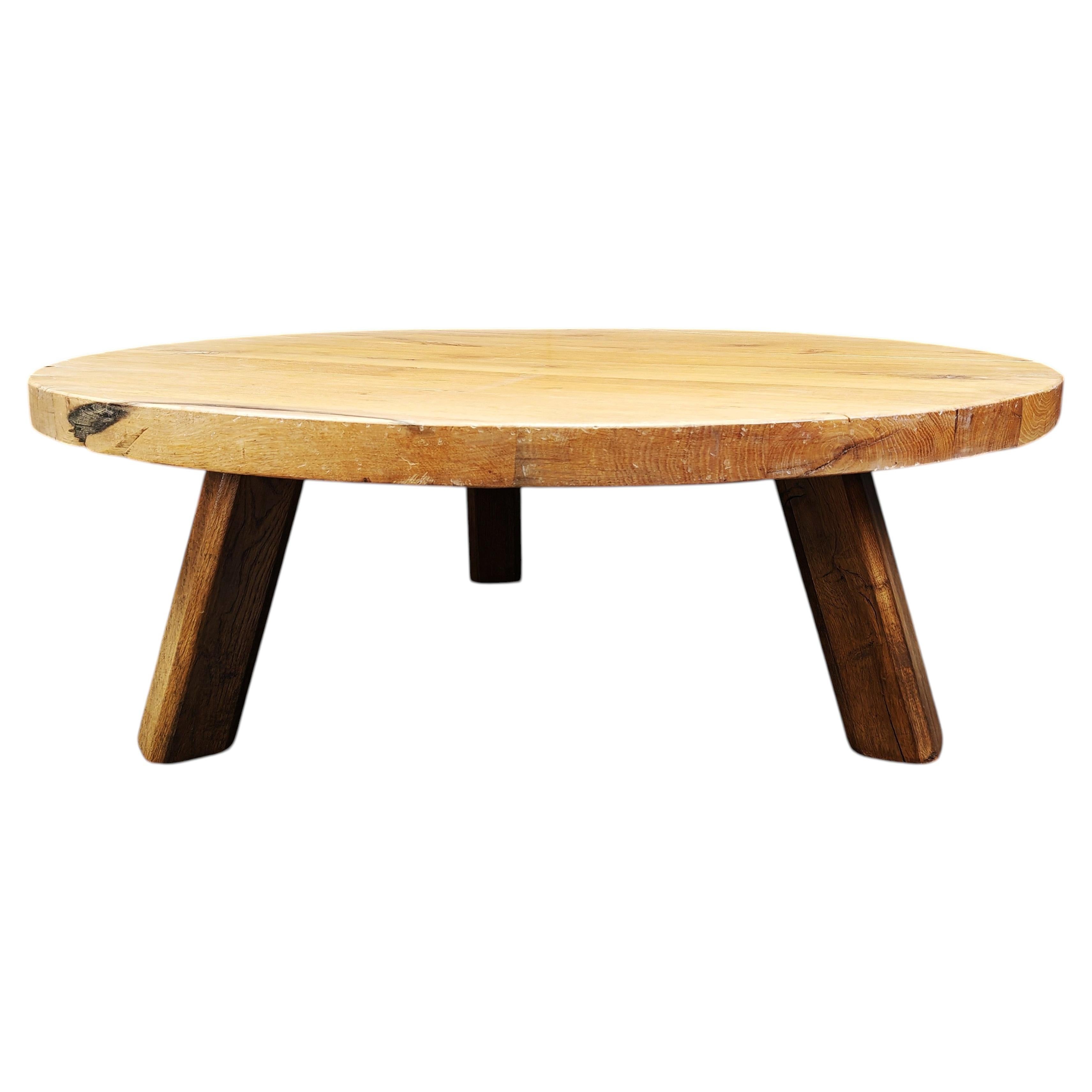 Large tripod round wooden brutalist coffee table, 1960s For Sale