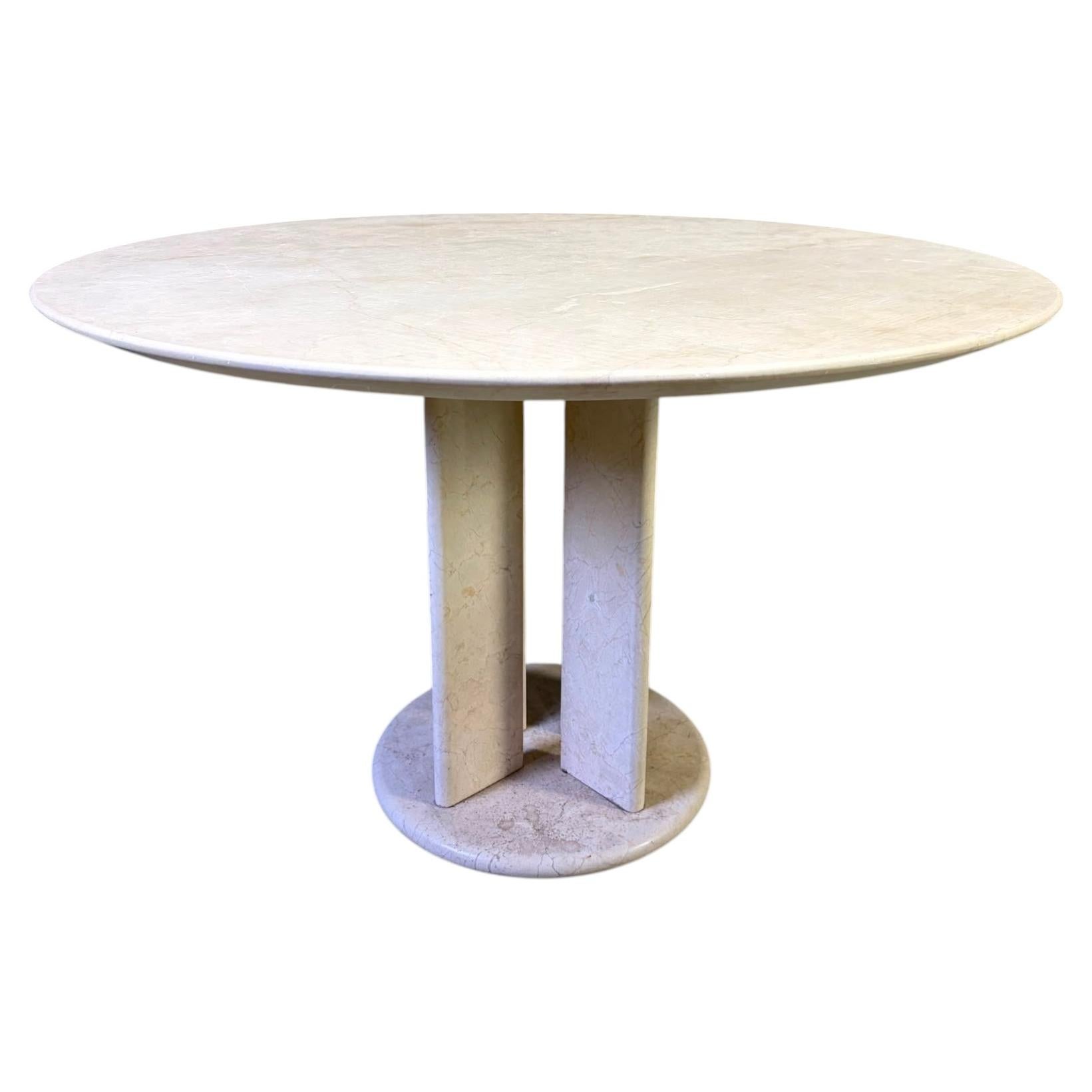 Round French travertine dining table 1970s For Sale