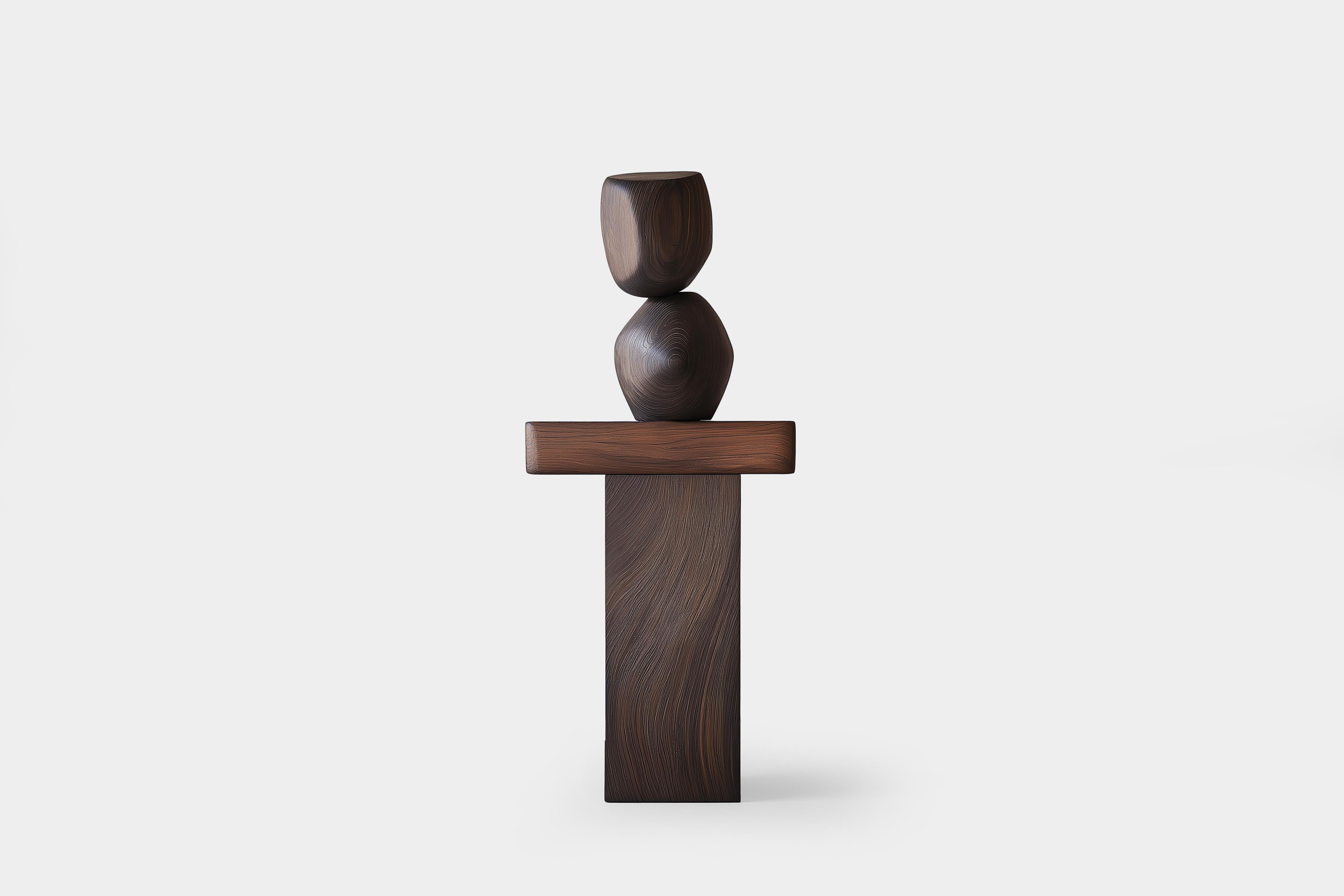 Artisanat d'art Lull No102 - Sculpture totem en bois par Joel Escalona

---
L'équilibre et la tension sont au cœur de ces sculptures. Le jeu entre les formes lisses et arrondies et les bases solides et angulaires crée un équilibre délicat qui invite