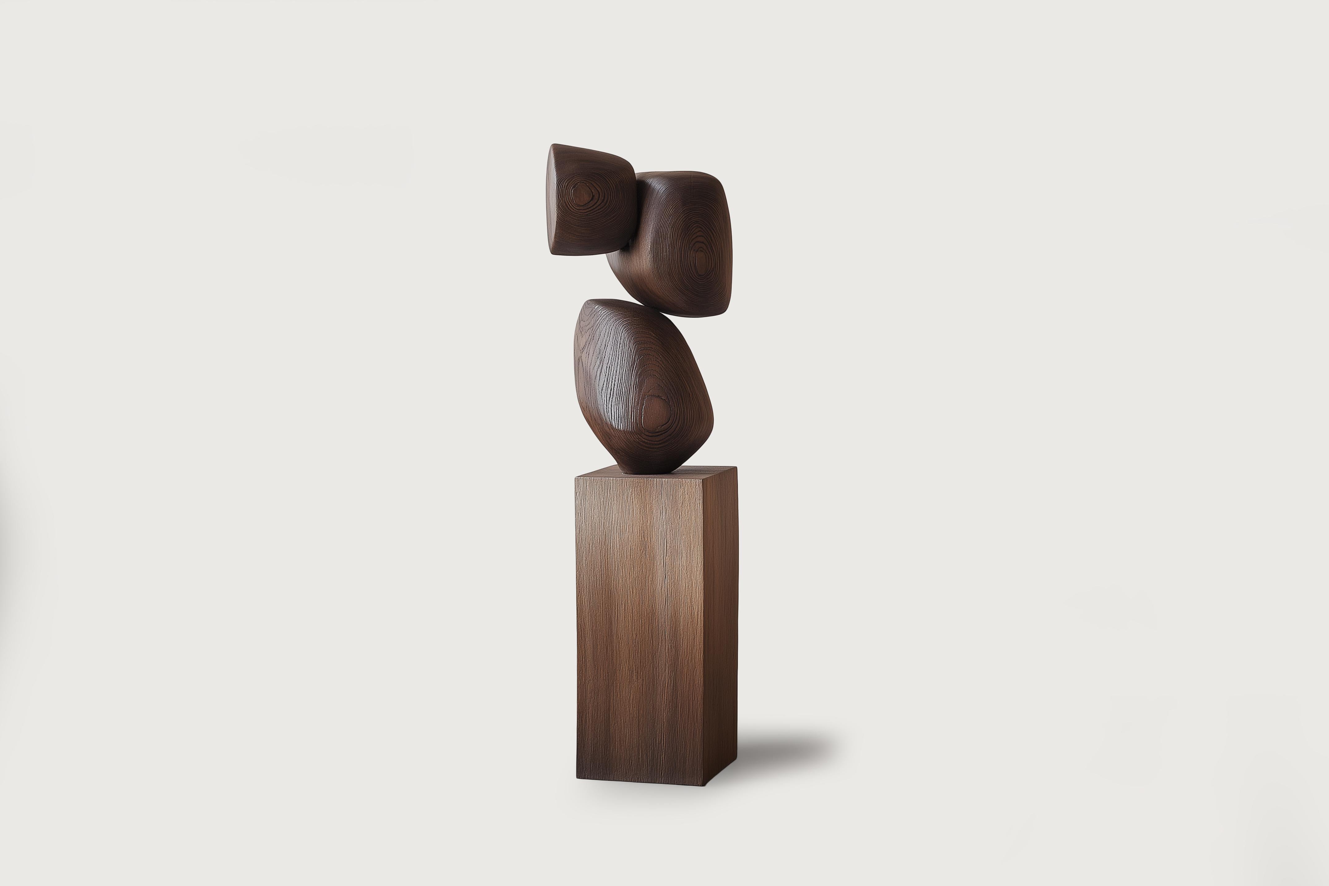 Lull No112 Wooden Totem Sculpture by Joel Escalona – Perfect for Luxury Spaces

———
Balance and tension are at the core of these sculptures. The interplay between the smooth, rounded forms and solid, angular bases creates a delicate equilibrium that