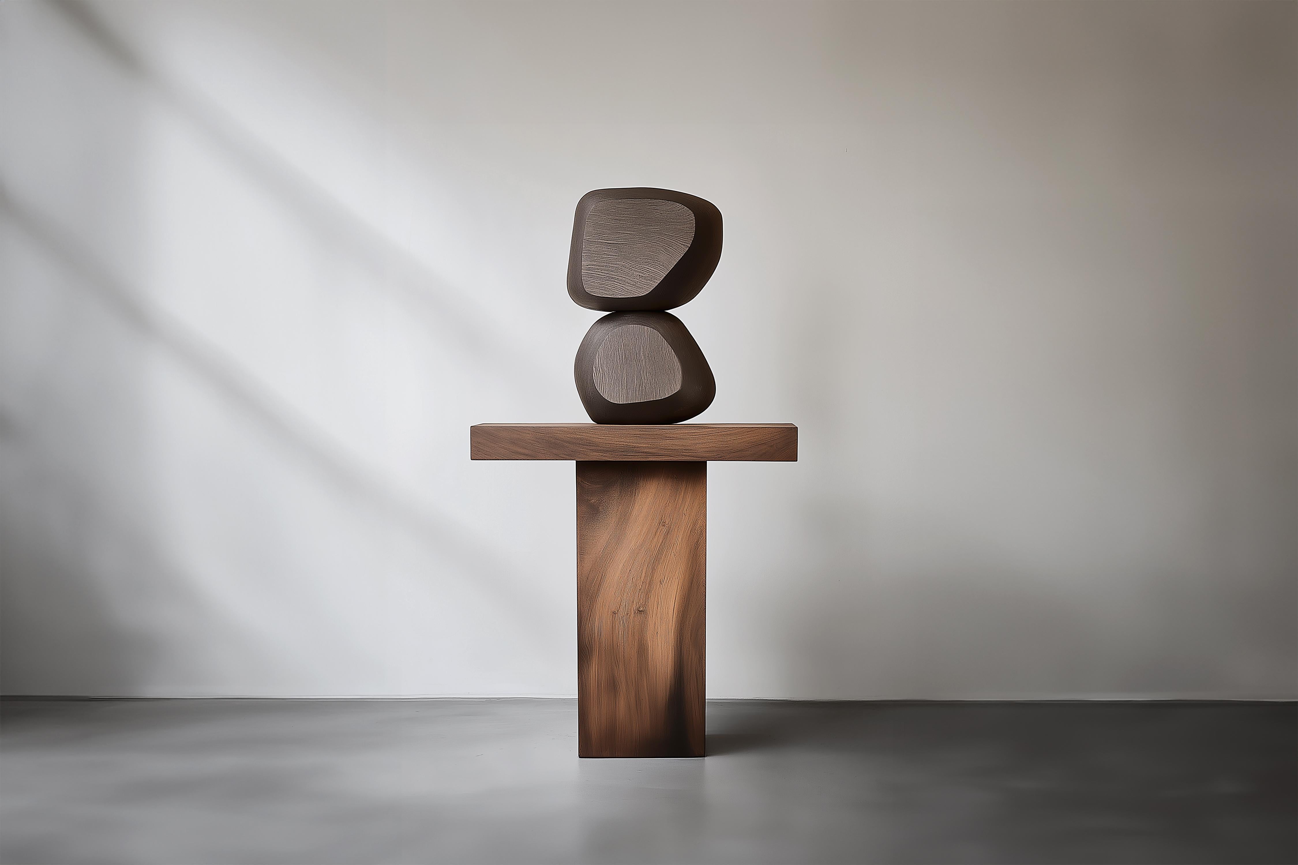 Contemporary Wooden Sculpture Lull No113 – NONO’s Decorative Object for Modern Interiors


———
Balance and tension are at the core of these sculptures. The interplay between the smooth, rounded forms and solid, angular bases creates a delicate