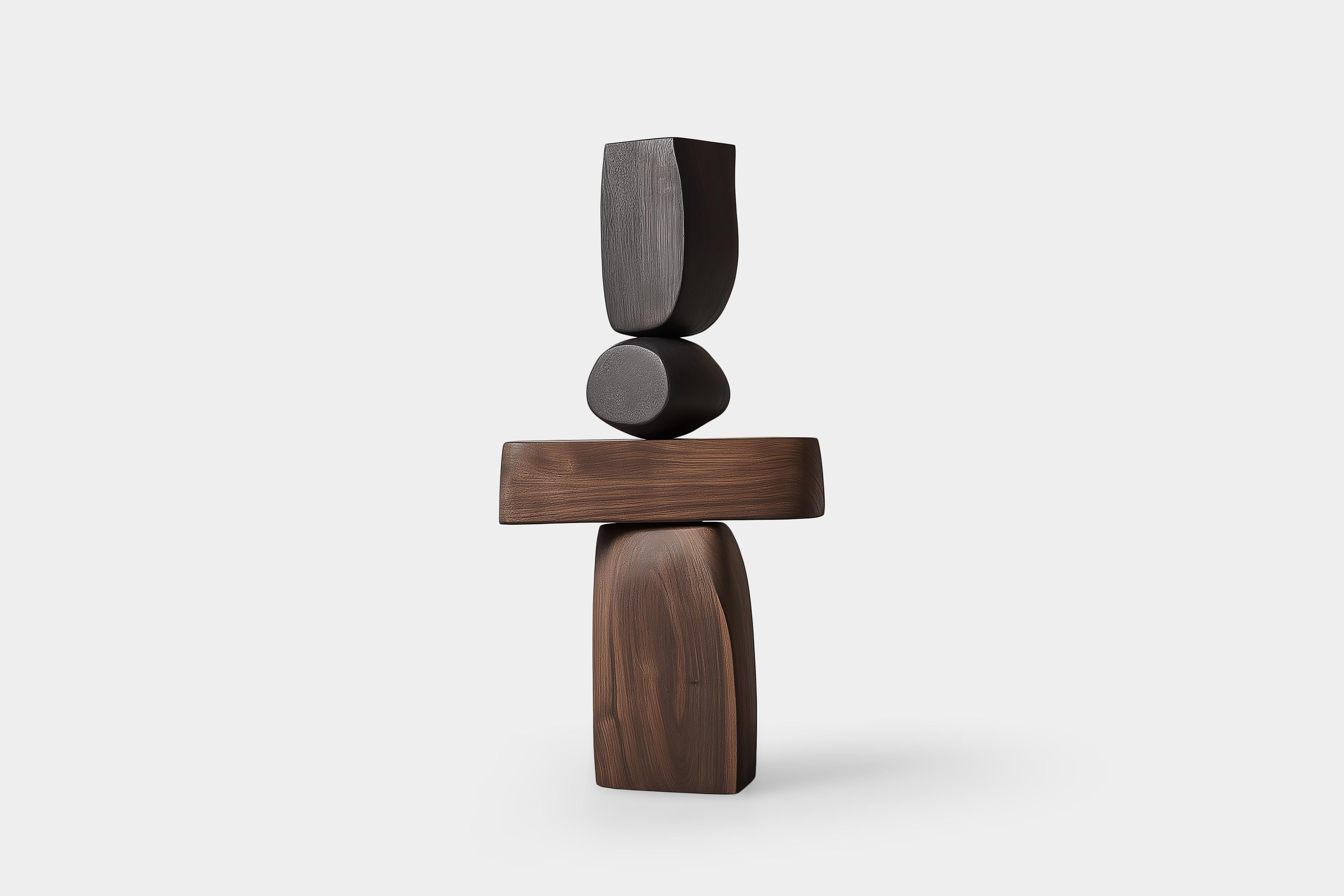 Lull No116 Sculpture géométrique en bois de Joel Escalona - Une pièce d'art moderne

---
L'équilibre et la tension sont au cœur de ces sculptures. Le jeu entre les formes lisses et arrondies et les bases solides et angulaires crée un équilibre