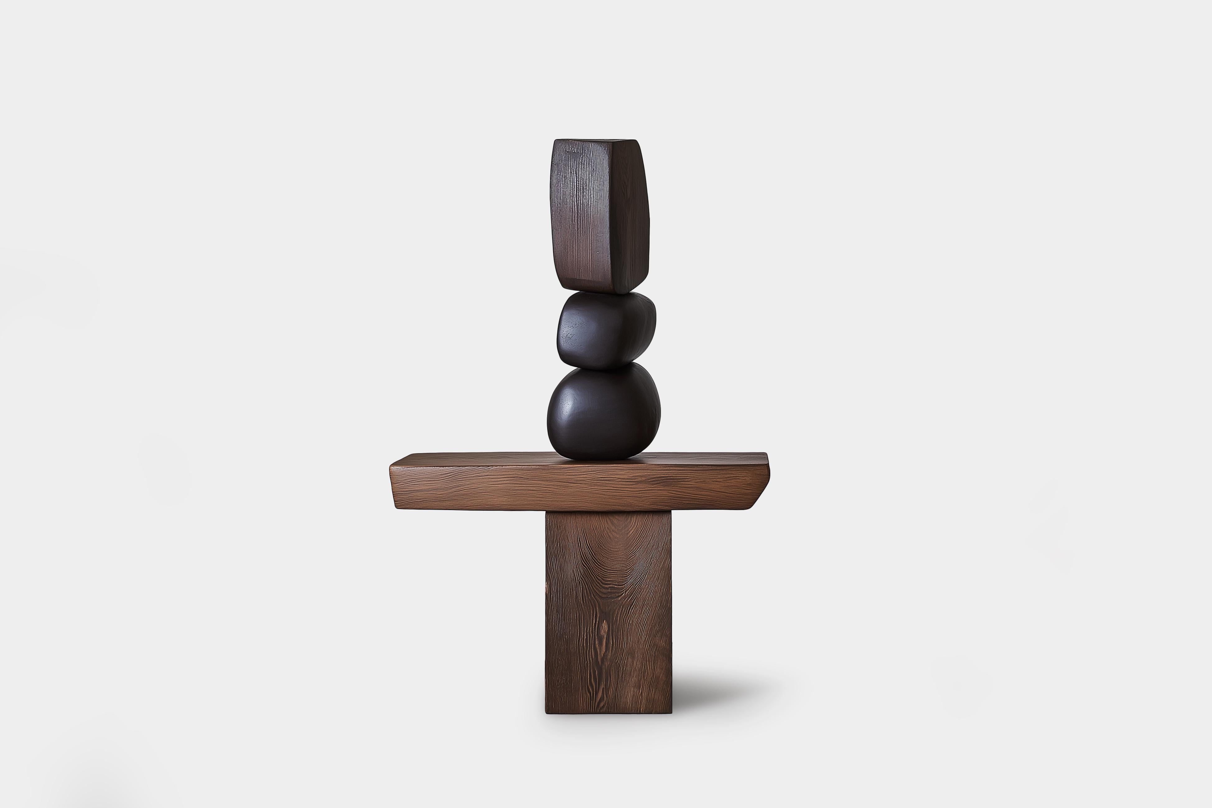 Scultura Totem in legno Lull No124 di Joel Escalona - Un complemento scultoreo

---
L'equilibrio e la tensione sono al centro di queste sculture. L'interazione tra le forme lisce e arrotondate e le basi solide e angolari crea un delicato equilibrio