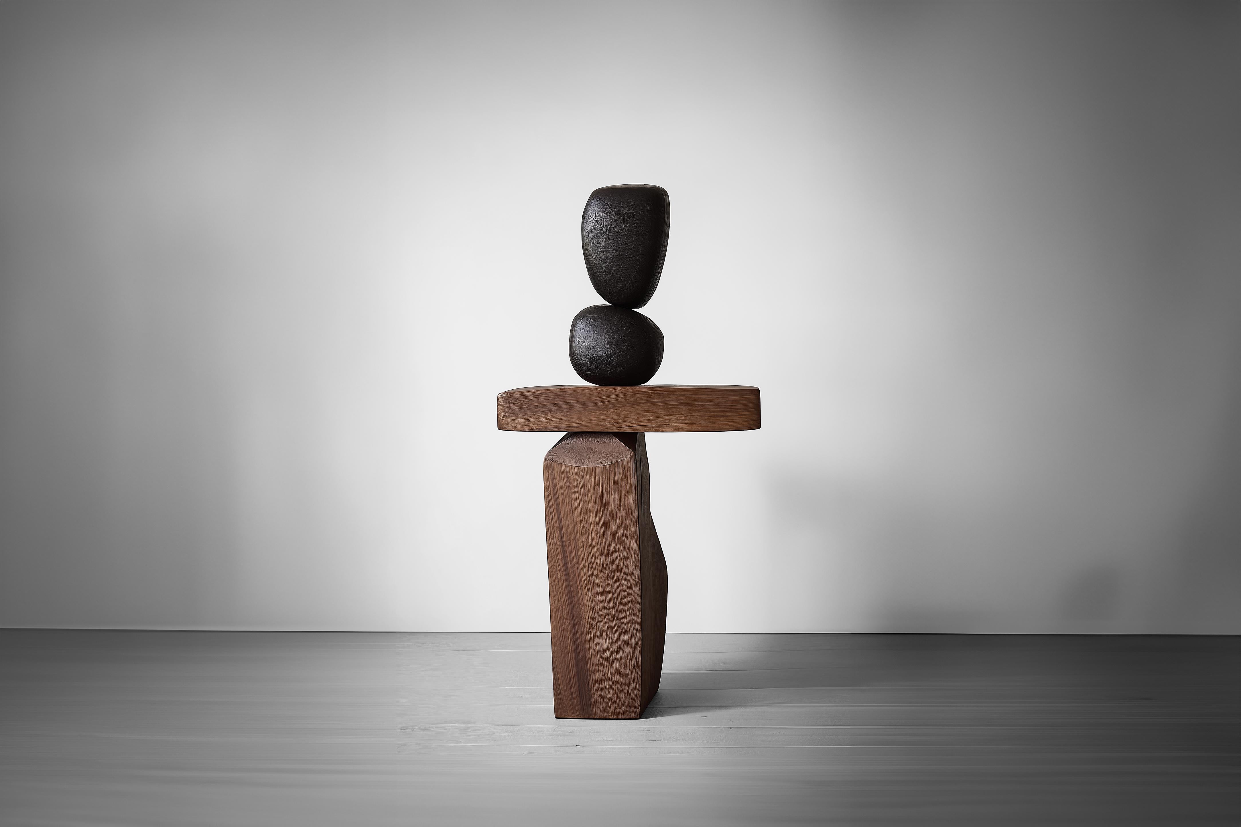Elemento artístico Lull No129 - Escultura de madera de NONO para interiores contemporáneos
---
El equilibrio y la tensión son el núcleo de estas esculturas. La interacción entre las formas suaves y redondeadas y las bases sólidas y angulosas crea un