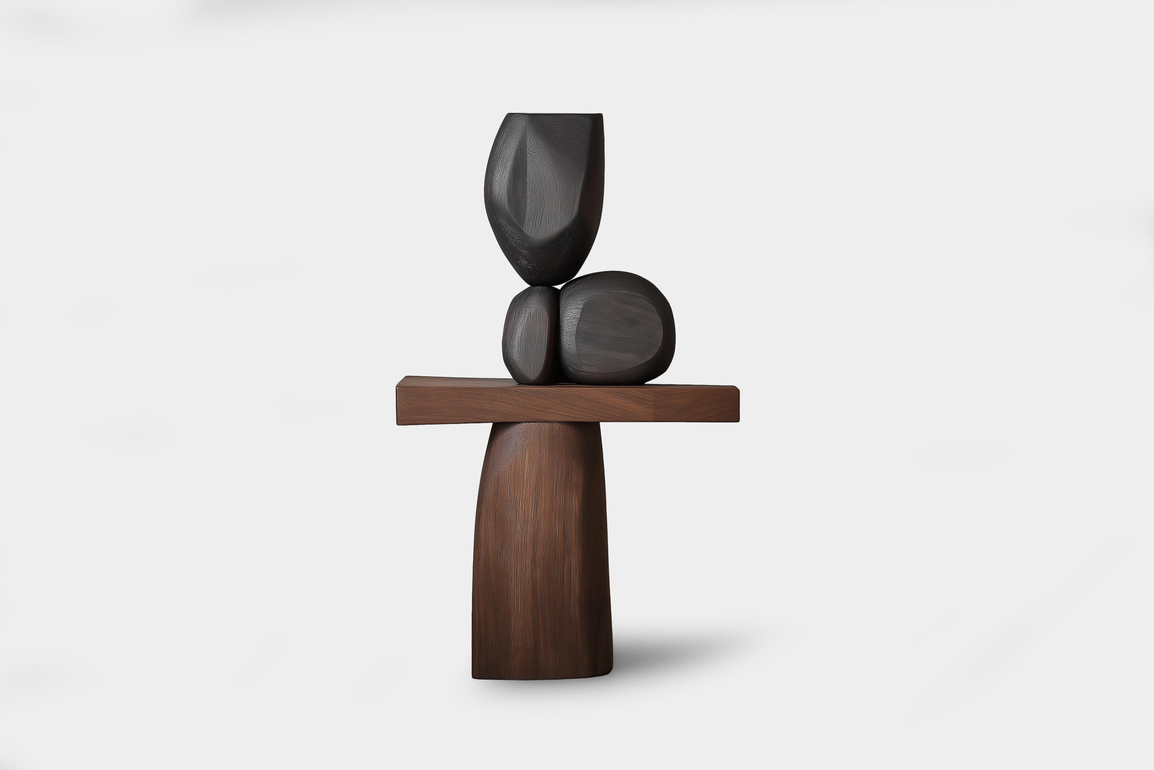 Scultura in legno Lull No132 per Interior Design/One - Realizzata da Joel Escalona

---
L'equilibrio e la tensione sono al centro di queste sculture. L'interazione tra le forme lisce e arrotondate e le basi solide e angolari crea un delicato