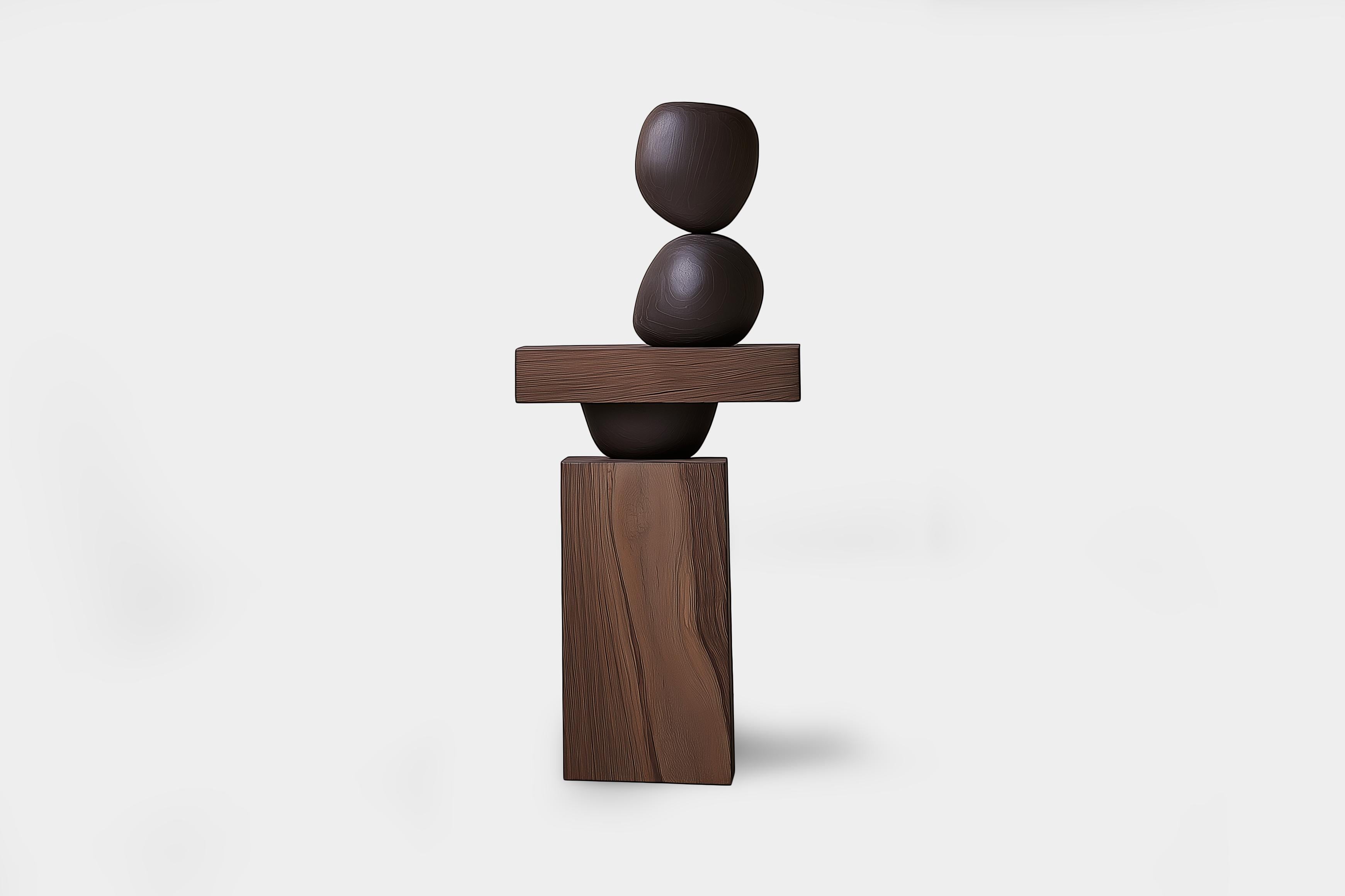 Lull No142 Escultura artesanal de madera de Joel Escalona - Ideal para interiores minimalistas

---
El equilibrio y la tensión son el núcleo de estas esculturas. La interacción entre las formas suaves y redondeadas y las bases sólidas y angulosas