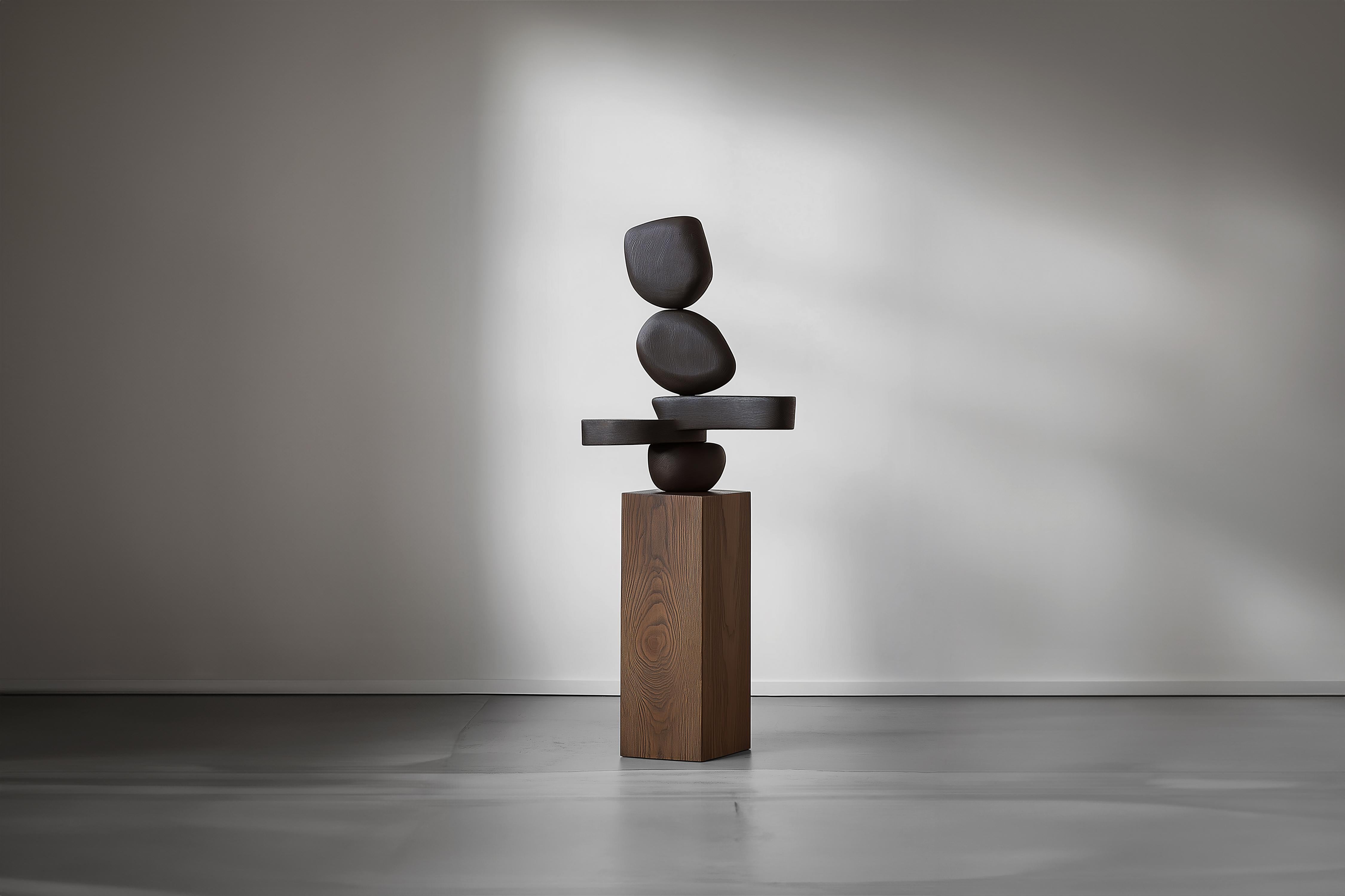 Lull No144 Escultura tótem de madera de Joel Escalona - Un acento escultórico


---
El equilibrio y la tensión son el núcleo de estas esculturas. La interacción entre las formas suaves y redondeadas y las bases sólidas y angulosas crea un delicado