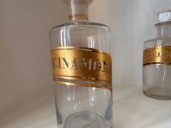 Set of Four Mid-19th Century French Apothecary Glass Jars with Gilt Labels