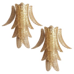 Coppia di appliques in vetro di Murano con foglie d'oro