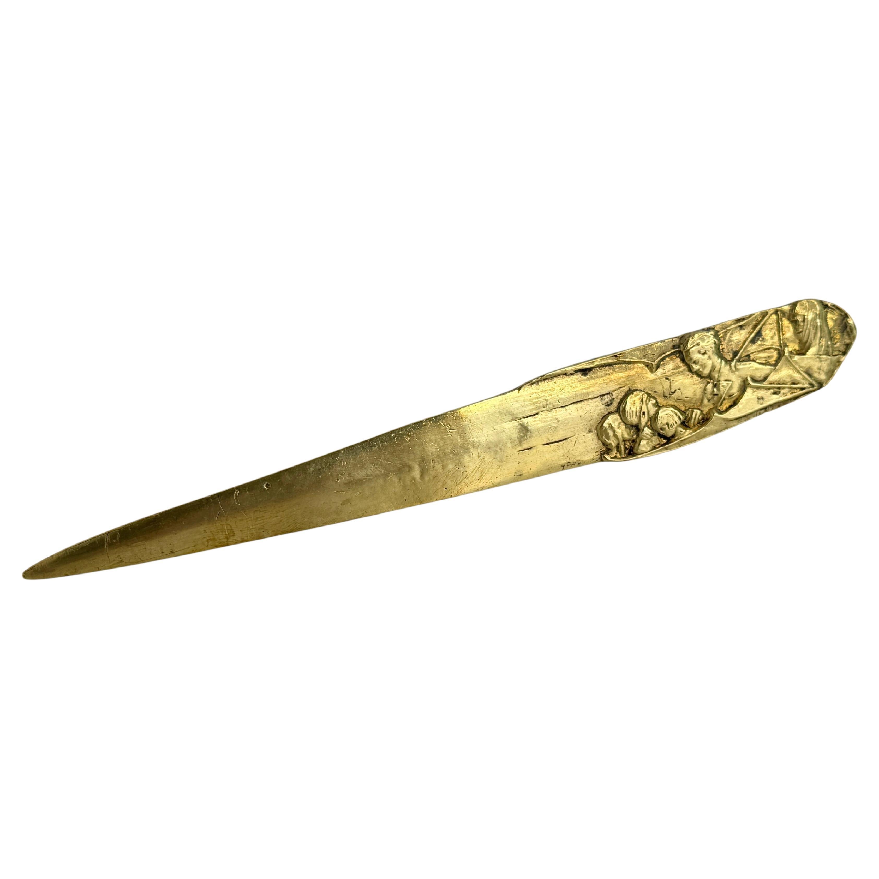 Tagliacarte in bronzo con iscrizione "Hommage de la Tricalcine Oxymenthol" Francia 1910