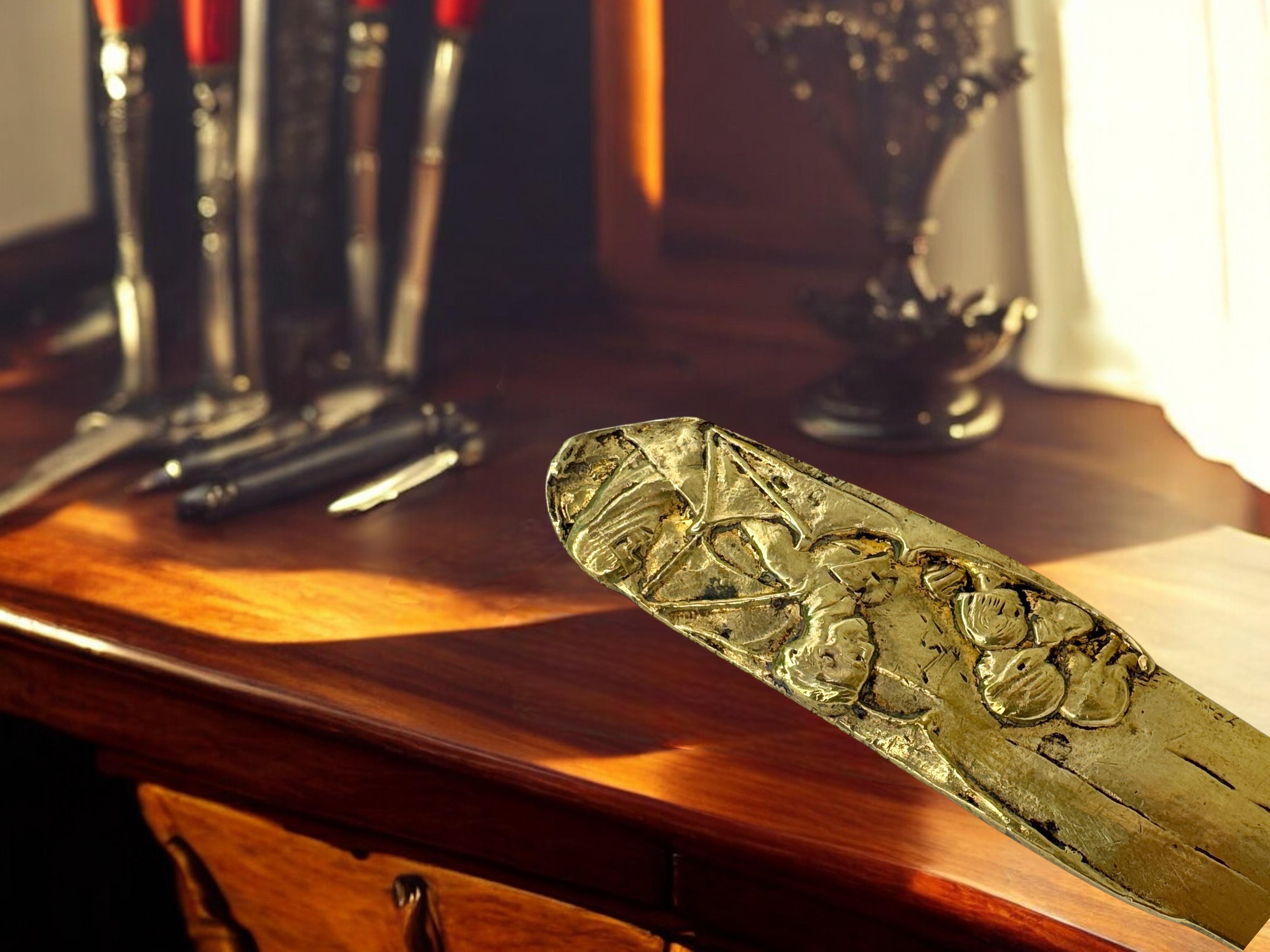 Brieföffner aus Bronze mit der Aufschrift 