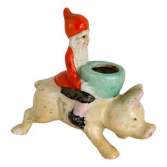 Cheerful Santa Gnome or Elf Riding atop a delightful Pink Pig Germany 1920s