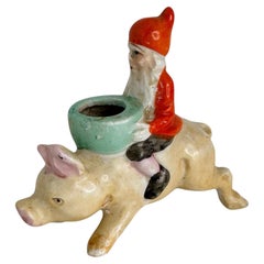Cheerful Santa Gnome or Elf Riding atop a delightful Pink Pig Germany 1920s