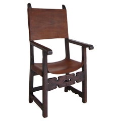 Sillón de nogal y cuero del siglo XVII