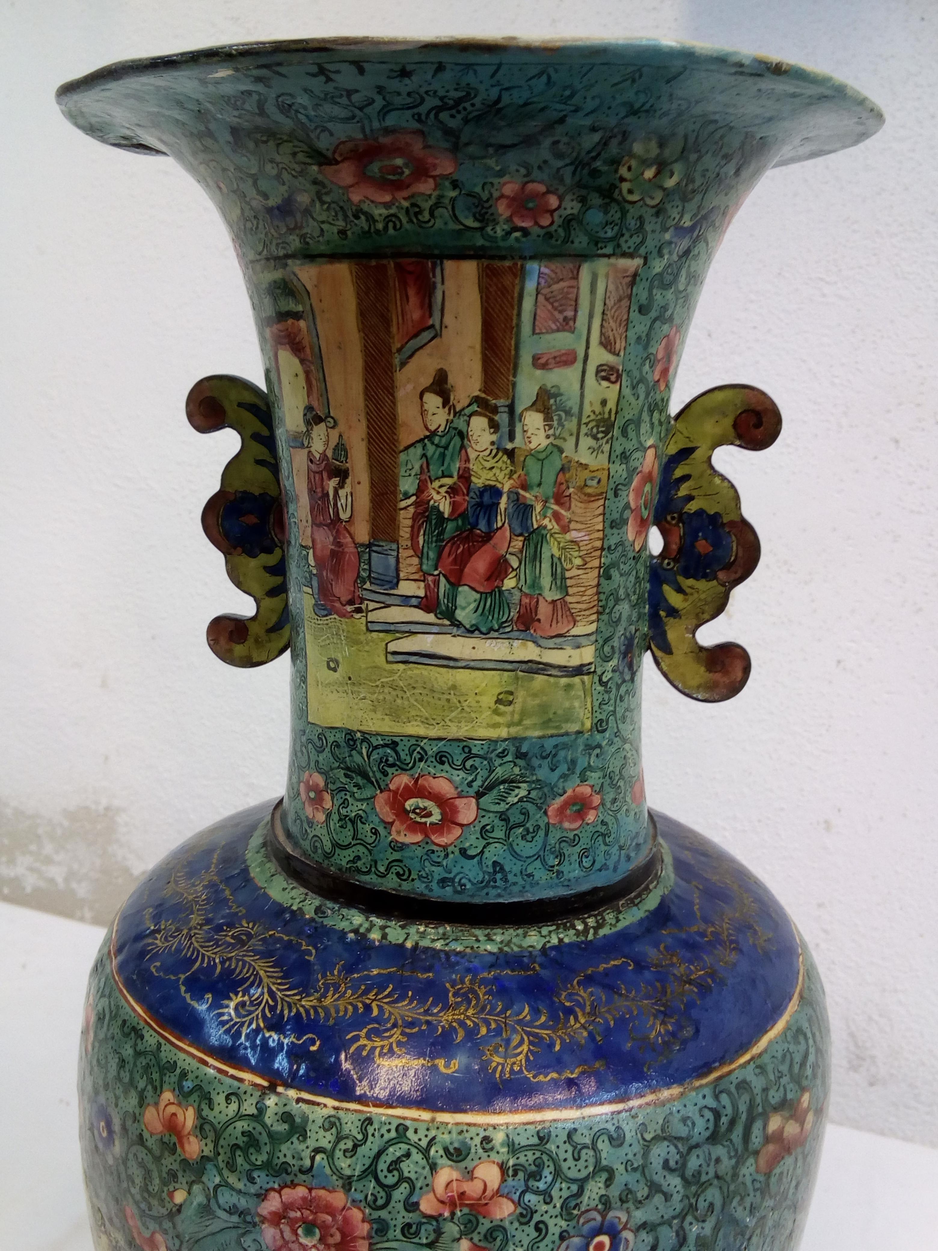 Description:
18th century French chinoiserie vase, in polychrome porcelain of the green family (yingcai), with a balustrade shape and a trumpet neck, decorated with scenes of court life within squared reserves, and the rest of the body decorated