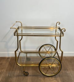Carrito de bebidas de latón de estilo neoclásico con bandejas de cristal de Maison Jansen