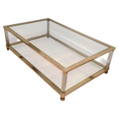 Large lucite and brass coffee table. French work. Circa 1970