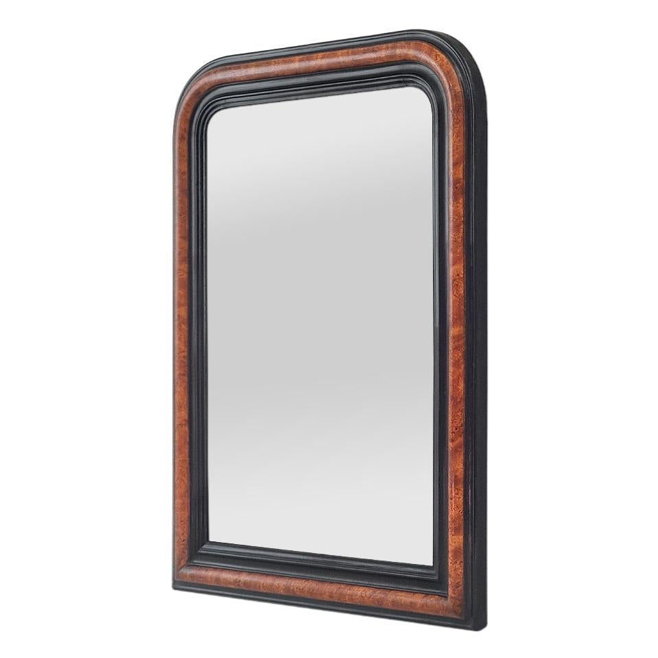 Antique French wall mirror in the Louis-Philippe style, circa 1880, with painted decoration imitation burl wood and ebony (Faux-bois). Original patina. Frame width: 9.5 cm / 3.74 in. Modern glass mirror.