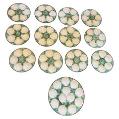 Juego de 13 piezas. Platos de ostras de mayólica francesa, Chantilly (Francia), alrededor de los años 70