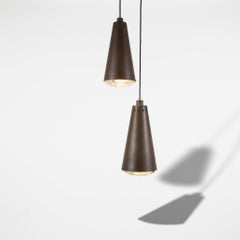 Pair of Pendant Lights with a Fontana Arte Faceted Crystal Diffuser and Corten-Eff
