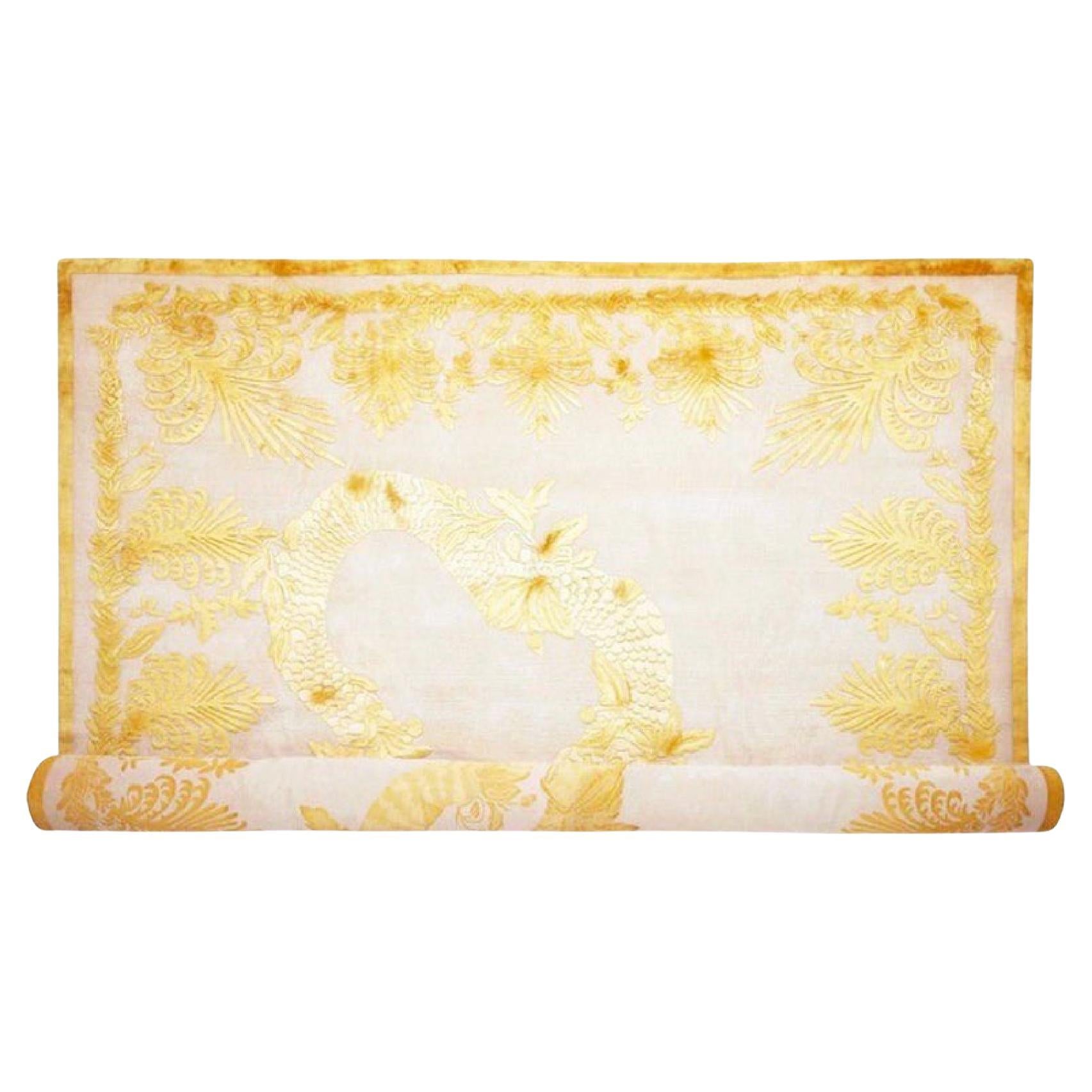 Alexander McQueen Military Brocade Palatial Rug, Gold, Ivory, Silk, Wool, 2012. Extremely rare 18’7” x 12’ size. Limited edition gold on ivory color way (2012). This dramatic design was originally conceived by McQueen for an embroidered coat in